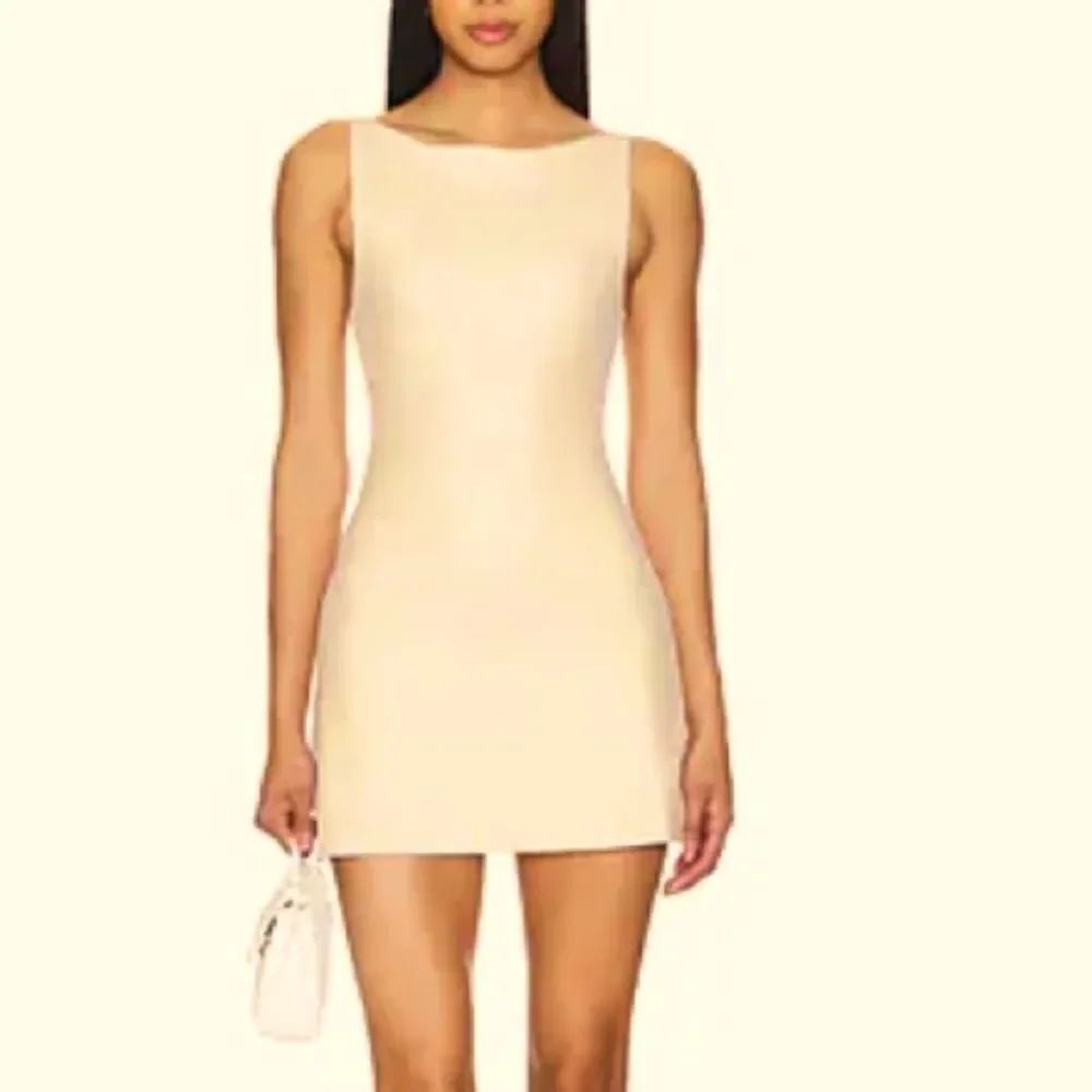Nubyen revolve cream skort dress